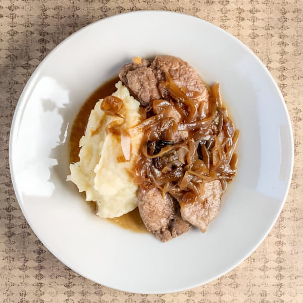 A plate of liver and onions with mashed potatoes and gravy from Rockwell's Red Lion Restaurant.